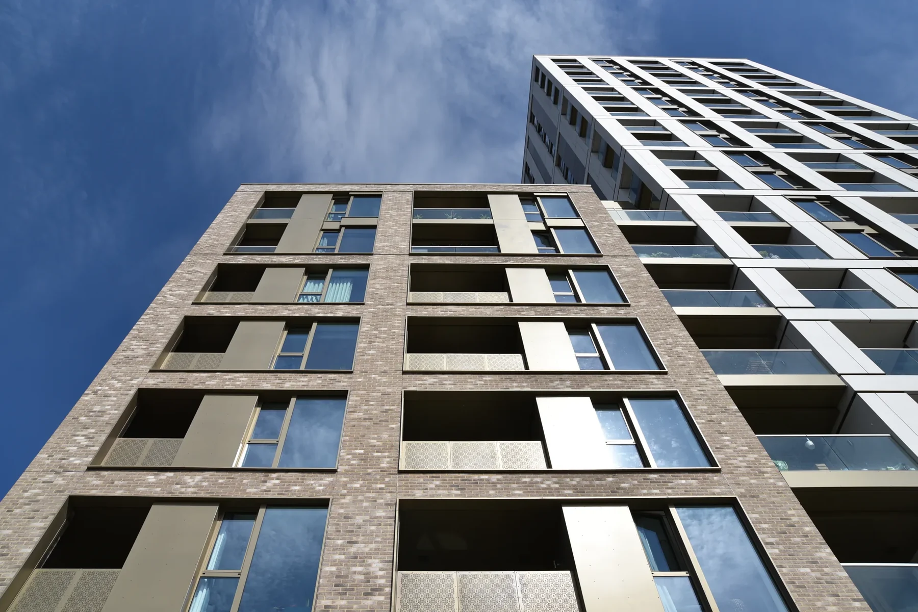 Thrayle House — view of the façades of two tall residential buildings